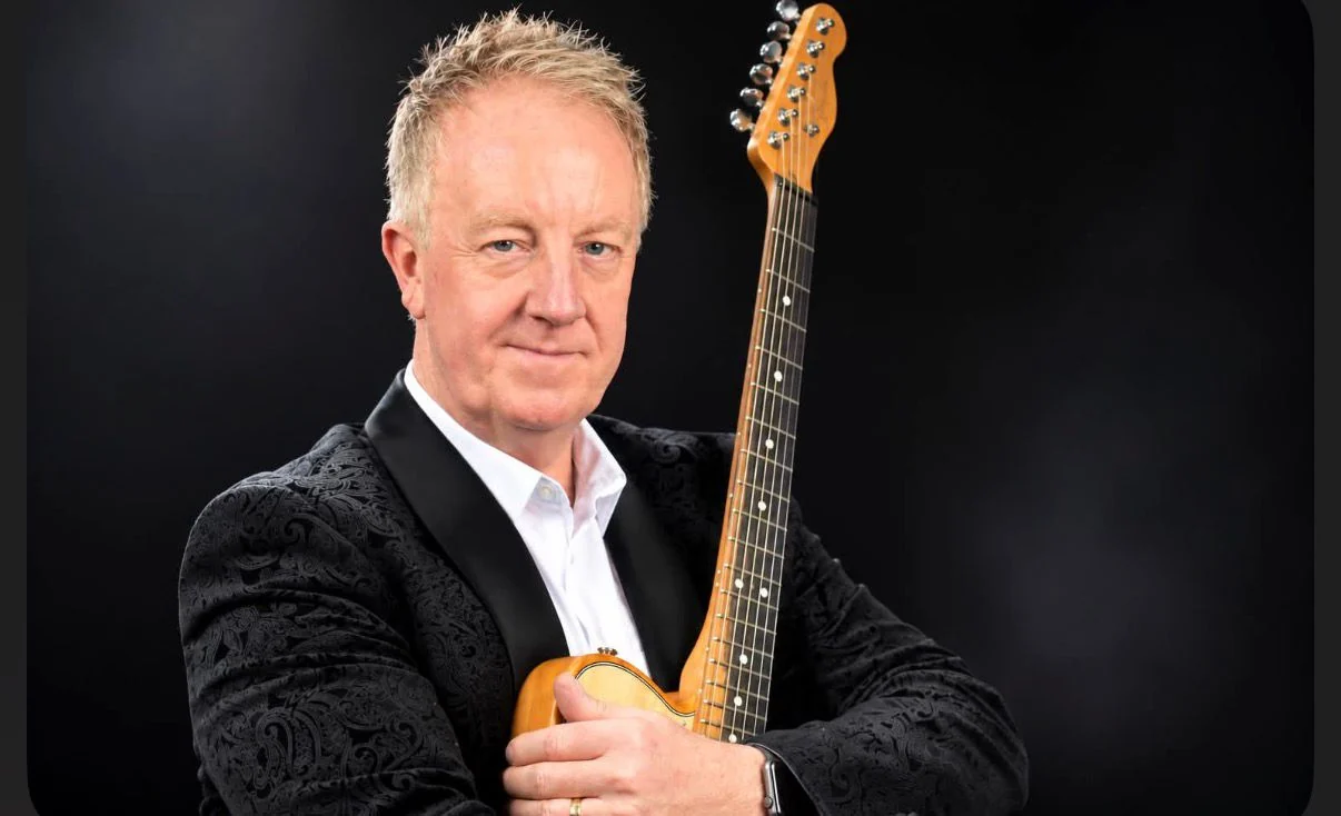 Steve Falcon with his guitar